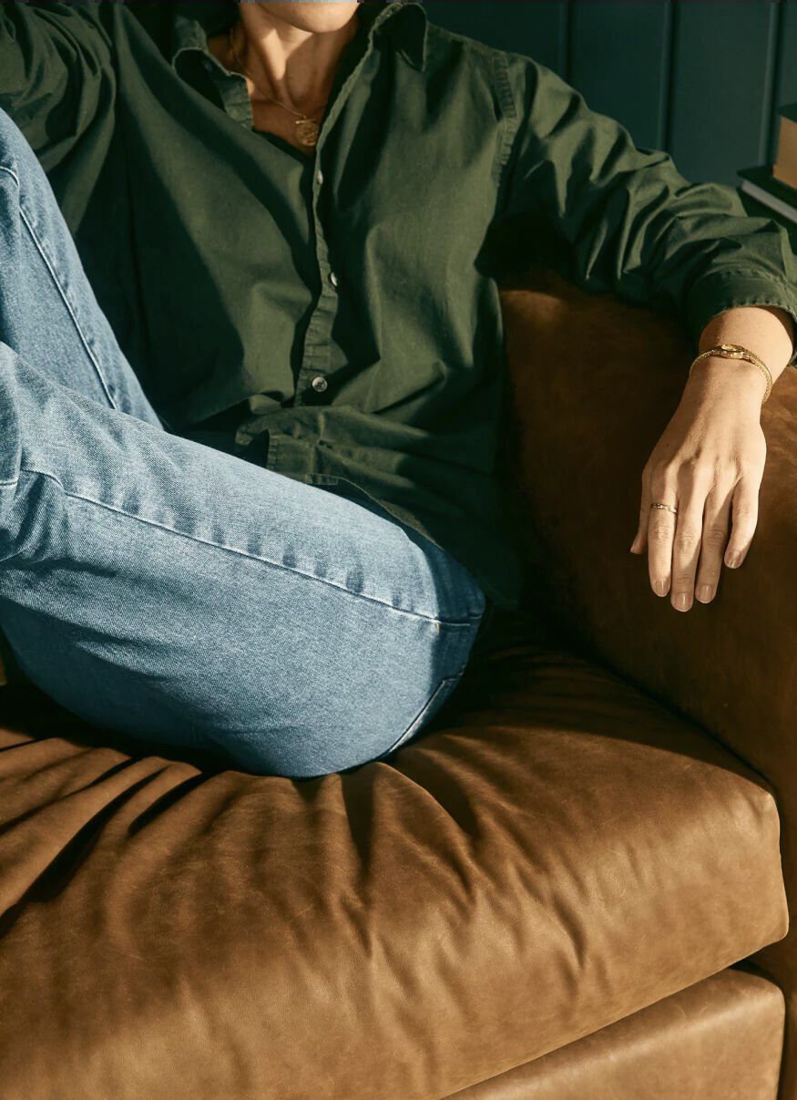 Woman sitting on comfortable cushion Woman sitting on comfortable cushion